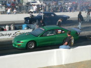 TURBO-POWERED GREEN DODGE AVENGER 10.5 OUTLAW CAR